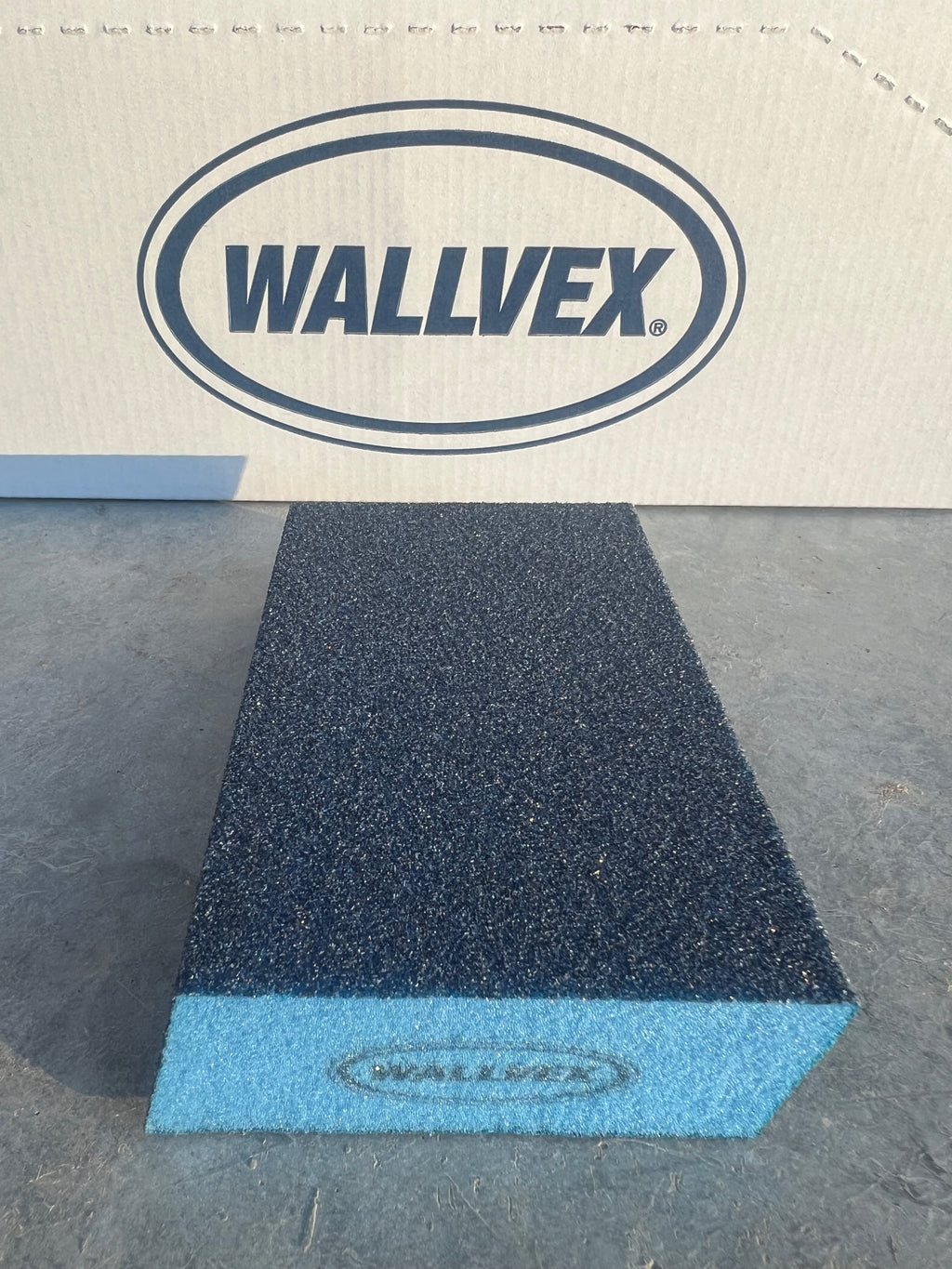 WALLVEX branded block on a textured surface